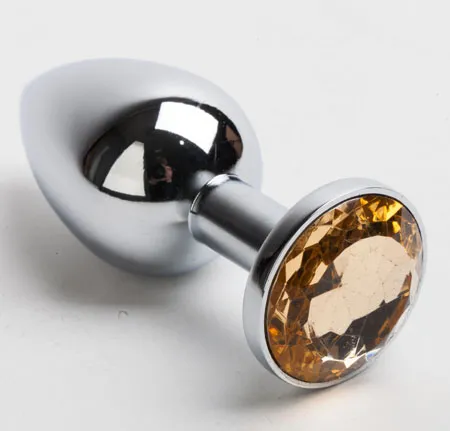 анальная пробка серебро со вставкой желтый страз s 47019-mm в Москве